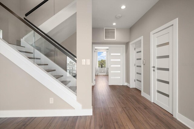 16047 Redington Dr, Redington Beach, FL 33708 - foyer entrance featuring stairs, recessed lighting, wood-type flooring, and baseboards