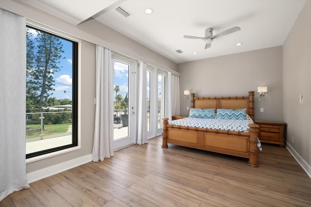 16047 Redington Dr, Redington Beach, FL 33708 - bedroom with access to exterior, multiple windows, light wood-style floors, baseboards, and recessed lighting