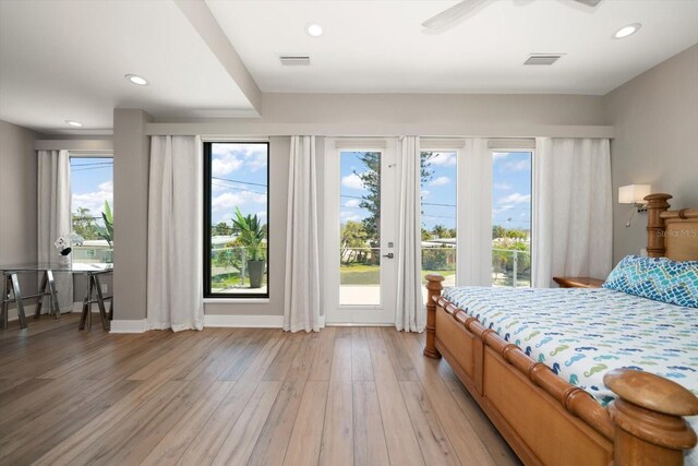 16047 Redington Dr, Redington Beach, FL 33708 - bedroom featuring access to outside, light wood finished floors, recessed lighting, and baseboards