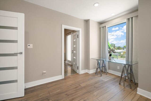 16047 Redington Dr, Redington Beach, FL 33708 - spare room with baseboards, wood finished floors, and recessed lighting