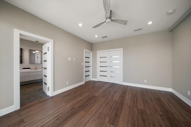 16047 Redington Dr, Redington Beach, FL 33708 - unfurnished bedroom featuring dark wood-style flooring, baseboards, recessed lighting, ceiling fan, and a closet