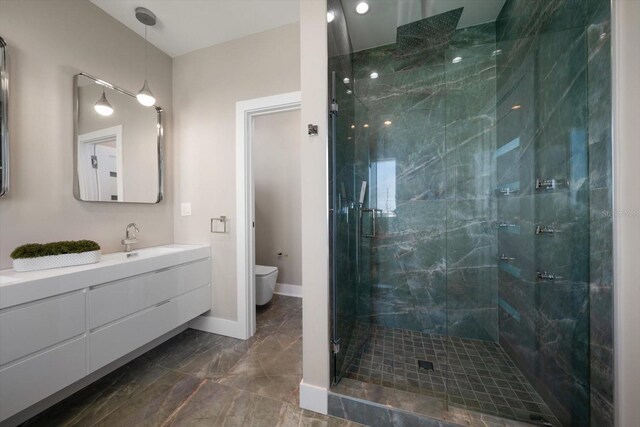 16047 Redington Dr, Redington Beach, FL 33708 - full bath with a marble finish shower, vanity, toilet, marble finish floors, and baseboards