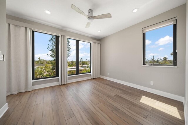 16047 Redington Dr, Redington Beach, FL 33708 - unfurnished room with wood finished floors, a ceiling fan, baseboards, and recessed lighting