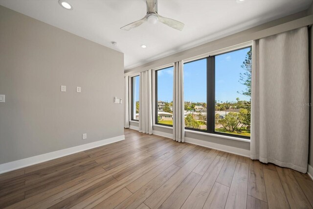16047 Redington Dr, Redington Beach, FL 33708 - unfurnished room featuring plenty of natural light, baseboards, ceiling fan, and recessed lighting