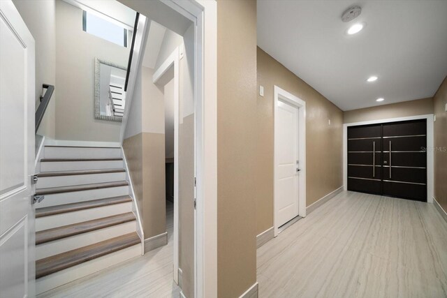 16047 Redington Dr, Redington Beach, FL 33708 - hallway with recessed lighting, stairway, and baseboards