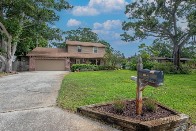 9465 126th Ave, Largo, FL 33773 - traditional-style house with concrete driveway, a garage, and brick siding