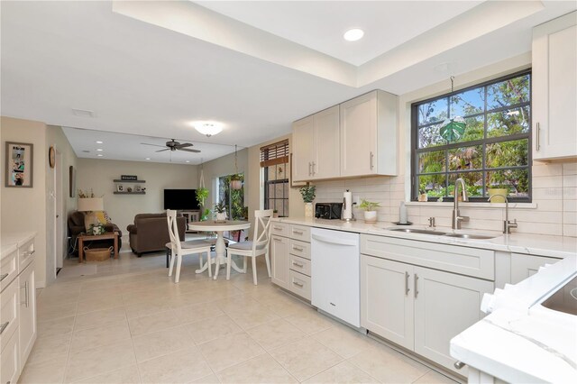 9465 126th Ave, Largo, FL 33773 - kitchen with white dishwasher, a sink, a ceiling fan, plenty of natural light, and recessed lighting