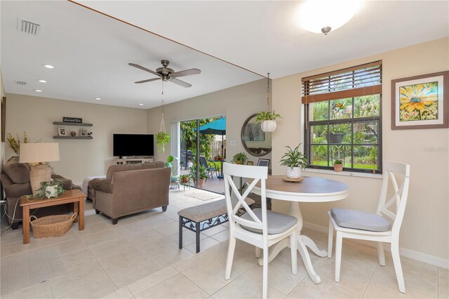 9465 126th Ave, Largo, FL 33773 - dining space featuring baseboards, light tile patterned flooring, ceiling fan, and recessed lighting