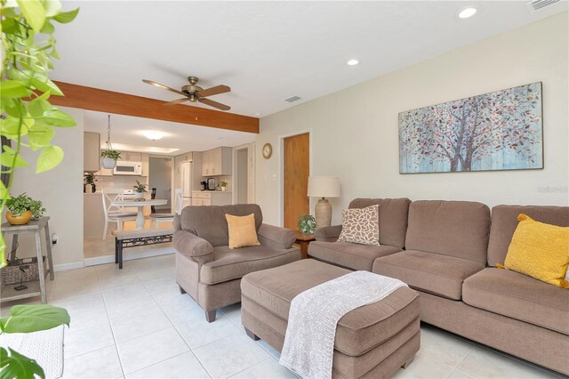 9465 126th Ave, Largo, FL 33773 - living room with ceiling fan, recessed lighting, light tile patterned flooring, and baseboards