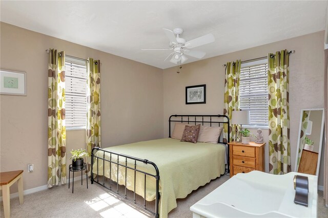 9465 126th Ave, Largo, FL 33773 - bedroom featuring carpet floors, a ceiling fan, and baseboards
