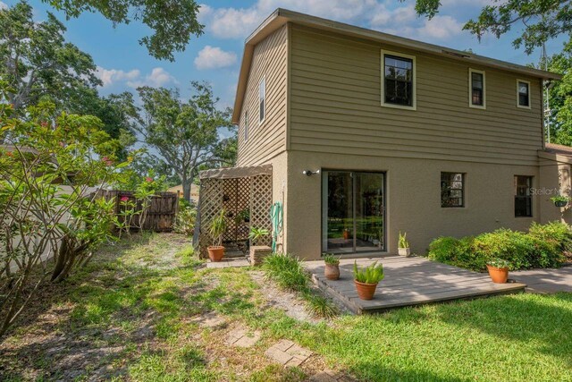 9465 126th Ave, Largo, FL 33773 - rear view of house with stucco siding