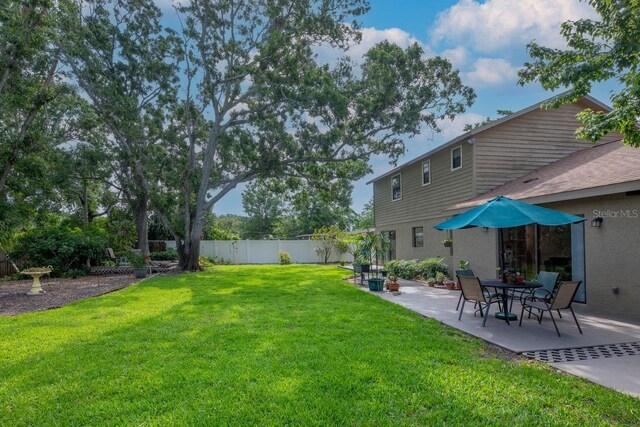 9465 126th Ave, Largo, FL 33773 - view of yard with a patio area