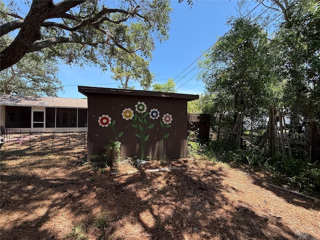 2033 Aaron Pl, Clearwater, FL 33760 - view of outdoor structure with a sunroom