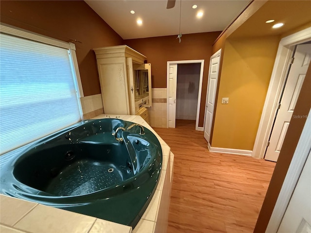 2033 Aaron Pl, Clearwater, FL 33760 - kitchen with light wood-style floors, recessed lighting, baseboards, and light countertops