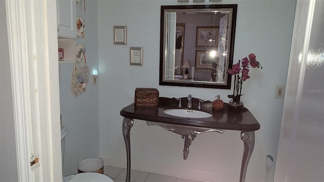 2033 Aaron Pl, Clearwater, FL 33760 - bathroom with toilet, tile patterned flooring, and a sink