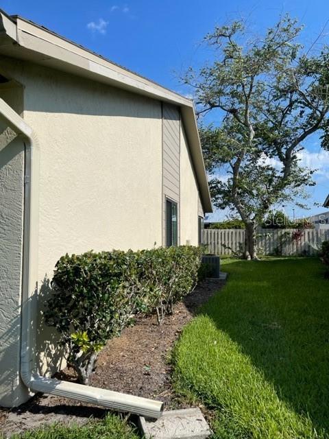 2714 60th Avenue Terrace W Unit 12D, Bradenton, FL 34207 - view of side of property featuring stucco siding