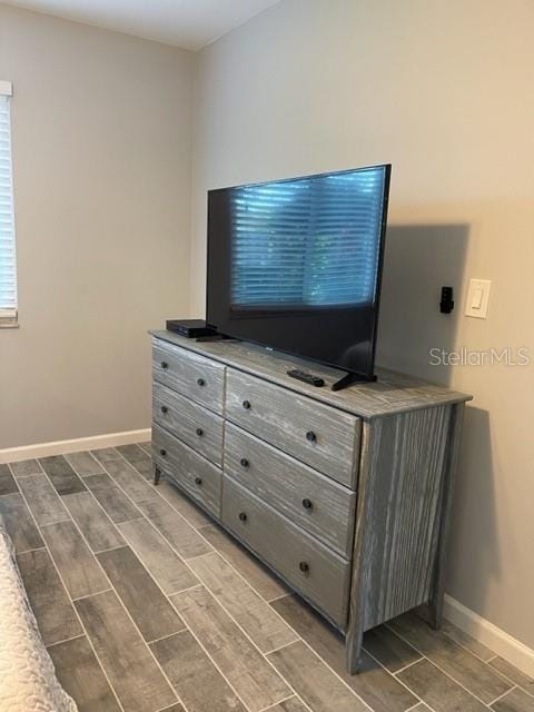 2714 60th Avenue Terrace W Unit 12D, Bradenton, FL 34207 - detailed view of wood tiled floors and baseboards