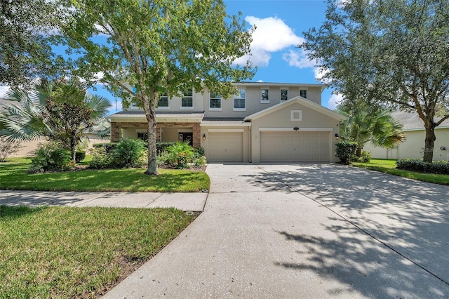 10833 Breaking Rocks Dr, Tampa, FL 33647 - view of front facade featuring a front lawn, stucco siding, concrete driveway, and an attached garage