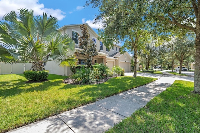 10833 Breaking Rocks Dr, Tampa, FL 33647 - view of side of home featuring driveway, stucco siding, and an attached garage