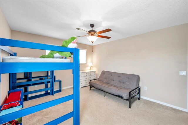 10833 Breaking Rocks Dr, Tampa, FL 33647 - carpeted bedroom with baseboards and a ceiling fan