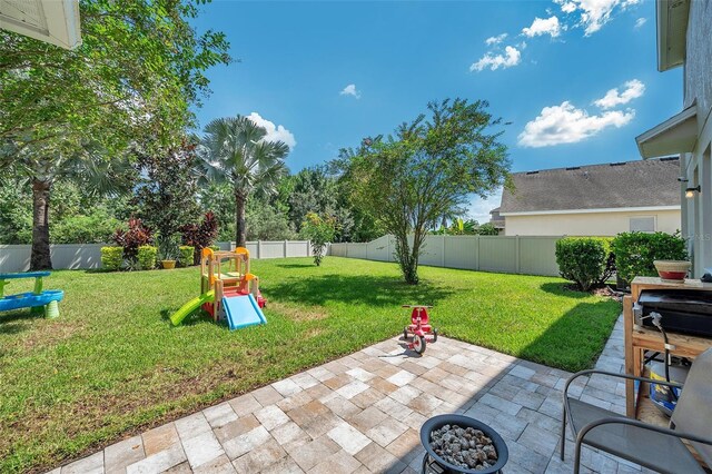 10833 Breaking Rocks Dr, Tampa, FL 33647 - view of patio with a playground
