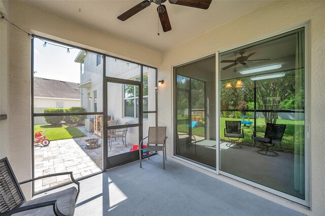 10833 Breaking Rocks Dr, Tampa, FL 33647 - sunroom featuring ceiling fan