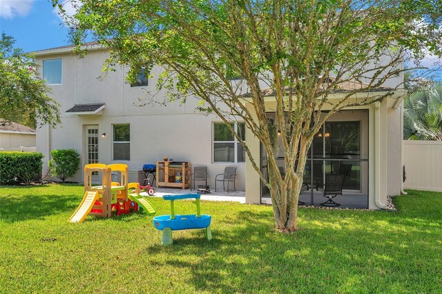 10833 Breaking Rocks Dr, Tampa, FL 33647 - back of property with stucco siding