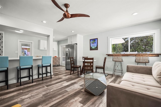2479 Trade Winds Dr, Dunedin, FL 34698 - living room featuring dark wood-style floors, ceiling fan, recessed lighting, and baseboards