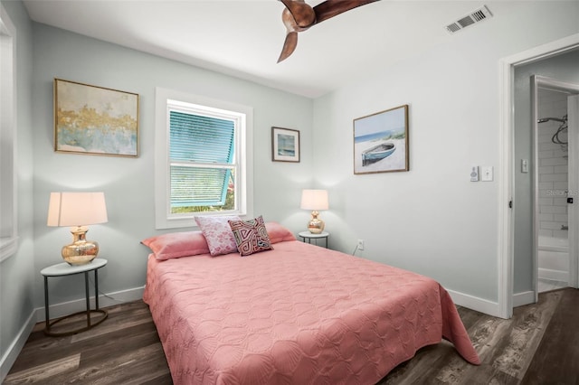2479 Trade Winds Dr, Dunedin, FL 34698 - bedroom with baseboards, wood finished floors, and a ceiling fan