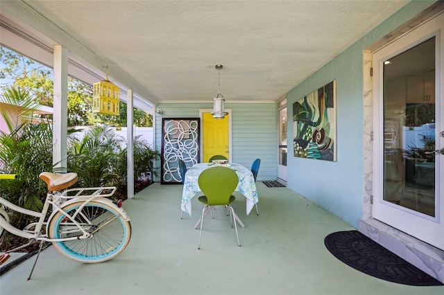 2479 Trade Winds Dr, Dunedin, FL 34698 - sunroom / solarium with concrete flooring and a textured ceiling