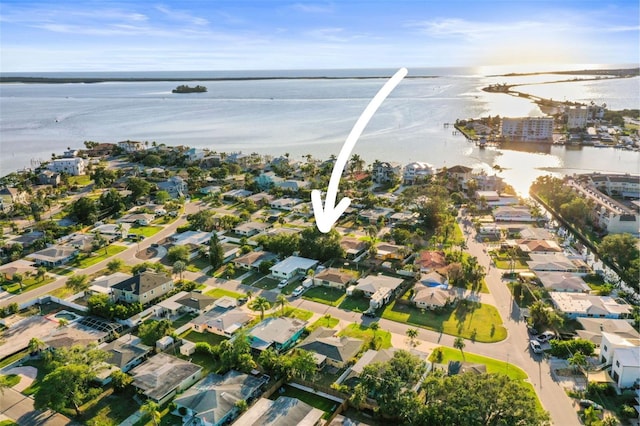 2479 Trade Winds Dr, Dunedin, FL 34698 - aerial view of property's location featuring a large body of water and nearby suburban area