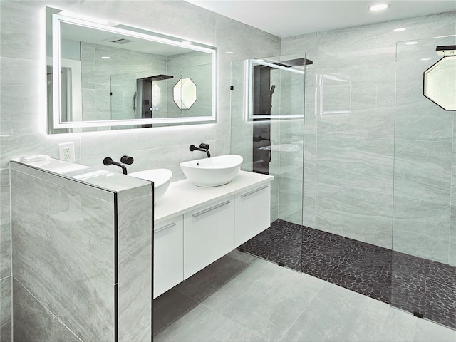 1178 Sultana St, Port Charlotte, FL 33952 - full bath with walk in shower, tile walls, vanity, recessed lighting, and tile patterned floors