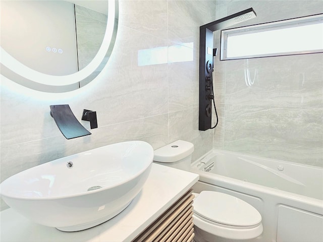 1178 Sultana St, Port Charlotte, FL 33952 - full bathroom with toilet, shower / washtub combination, tile walls, and vanity
