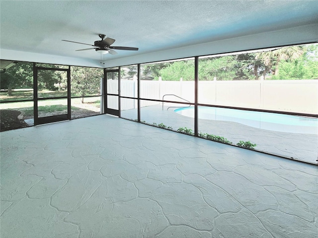 1178 Sultana St, Port Charlotte, FL 33952 - unfurnished sunroom featuring a ceiling fan