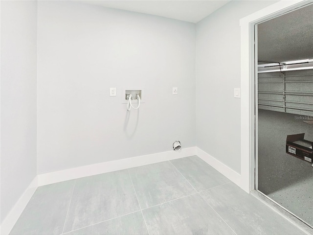 1178 Sultana St, Port Charlotte, FL 33952 - washroom featuring baseboards, hookup for a washing machine, and tile patterned flooring