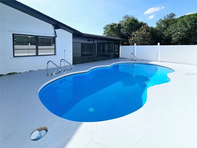 1178 Sultana St, Port Charlotte, FL 33952 - view of swimming pool with a patio area and a sunroom