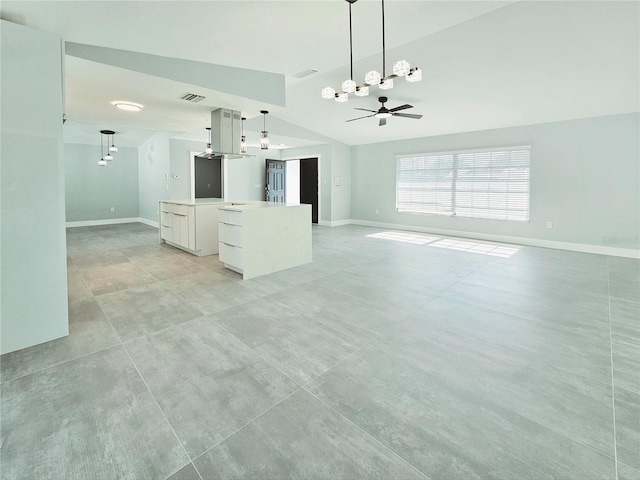 1178 Sultana St, Port Charlotte, FL 33952 - unfurnished living room with a chandelier, baseboards, lofted ceiling, and ceiling fan