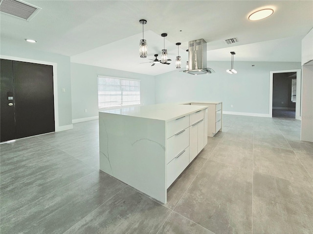 1178 Sultana St, Port Charlotte, FL 33952 - kitchen with modern cabinets, a chandelier, white cabinets, island exhaust hood, and pendant lighting