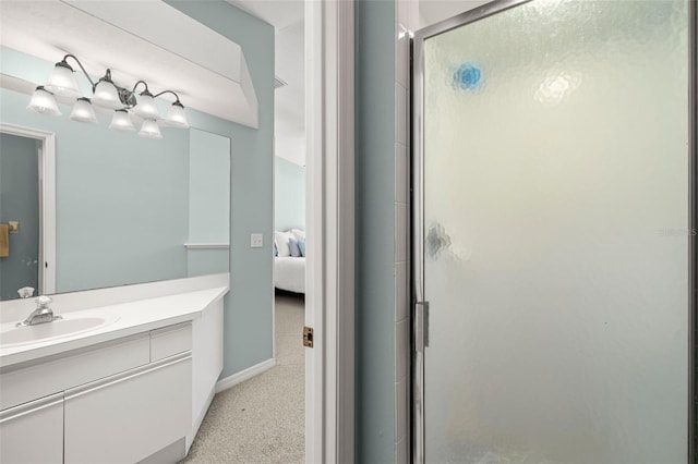 616 Garland Cir, Indian Rocks Beach, FL 33785 - bathroom with ensuite bath, vanity, a stall shower, and baseboards