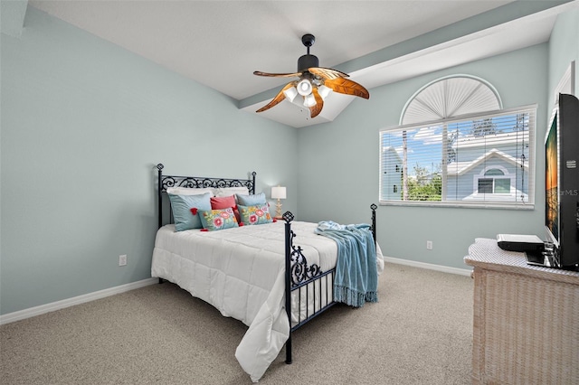 616 Garland Cir, Indian Rocks Beach, FL 33785 - bedroom with vaulted ceiling, carpet floors, baseboards, and ceiling fan