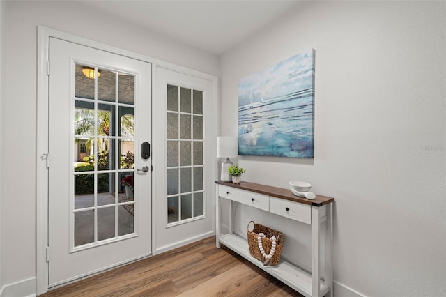 616 Garland Cir, Indian Rocks Beach, FL 33785 - entryway with wood finished floors