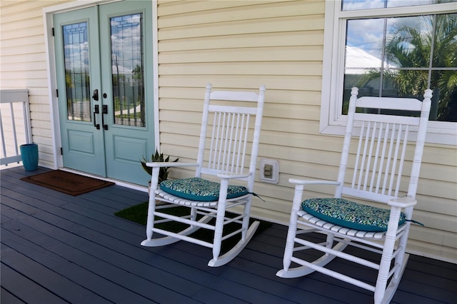 24197 Treasure Island Blvd, Punta Gorda, FL 33955 - wooden terrace featuring french doors