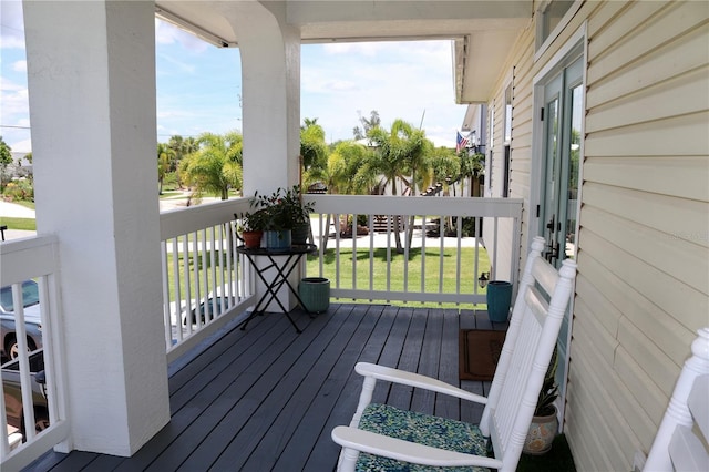 24197 Treasure Island Blvd, Punta Gorda, FL 33955 - wooden deck featuring a yard
