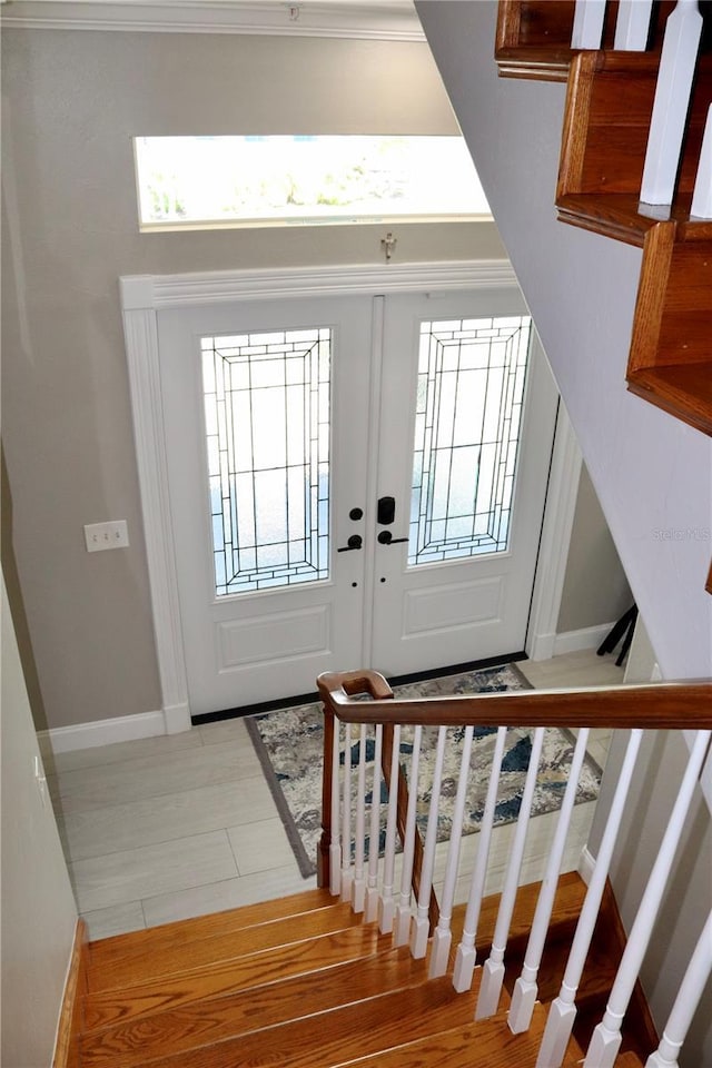 24197 Treasure Island Blvd, Punta Gorda, FL 33955 - foyer featuring plenty of natural light and stairs