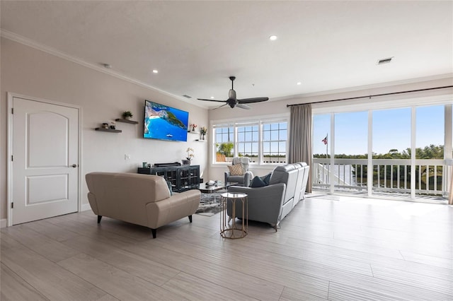 24197 Treasure Island Blvd, Punta Gorda, FL 33955 - living area featuring a ceiling fan, crown molding, light wood-style flooring, and recessed lighting
