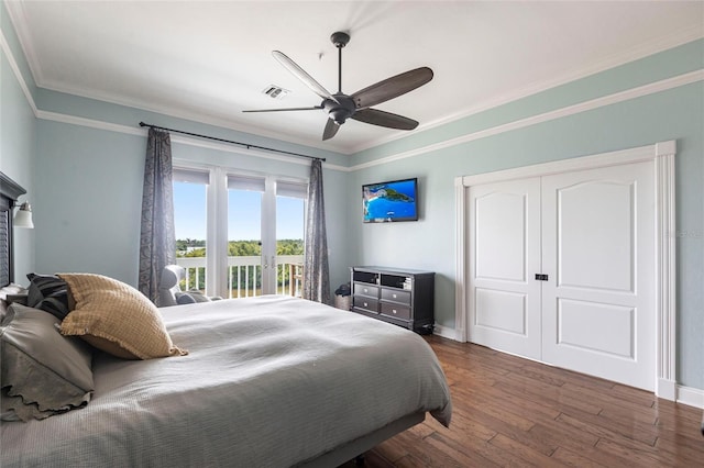 24197 Treasure Island Blvd, Punta Gorda, FL 33955 - bedroom featuring access to outside, hardwood / wood-style flooring, ornamental molding, a closet, and a ceiling fan