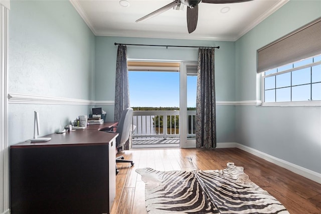 24197 Treasure Island Blvd, Punta Gorda, FL 33955 - home office with ornamental molding, a ceiling fan, and wood-type flooring