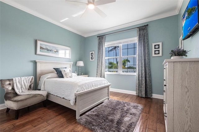 24197 Treasure Island Blvd, Punta Gorda, FL 33955 - bedroom featuring crown molding, dark wood finished floors, multiple windows, and ceiling fan