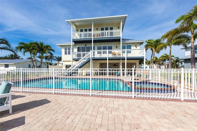 24197 Treasure Island Blvd, Punta Gorda, FL 33955 - view of pool with a pool with connected hot tub, stairway, and a patio