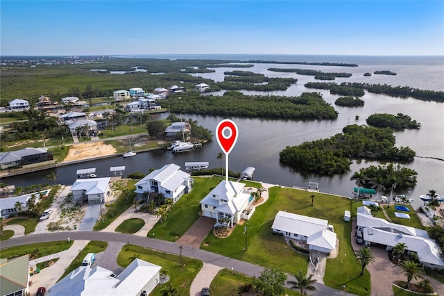 24197 Treasure Island Blvd, Punta Gorda, FL 33955 - aerial view of property's location with a large body of water
